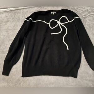 Kathy Ireland Black Sweatshirt with White Bow Detail